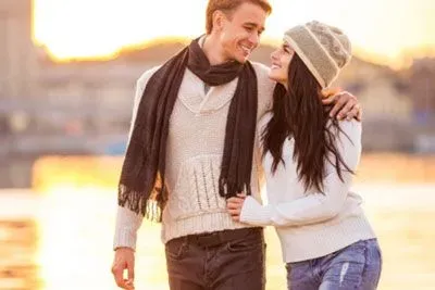 Couple walking in sunset